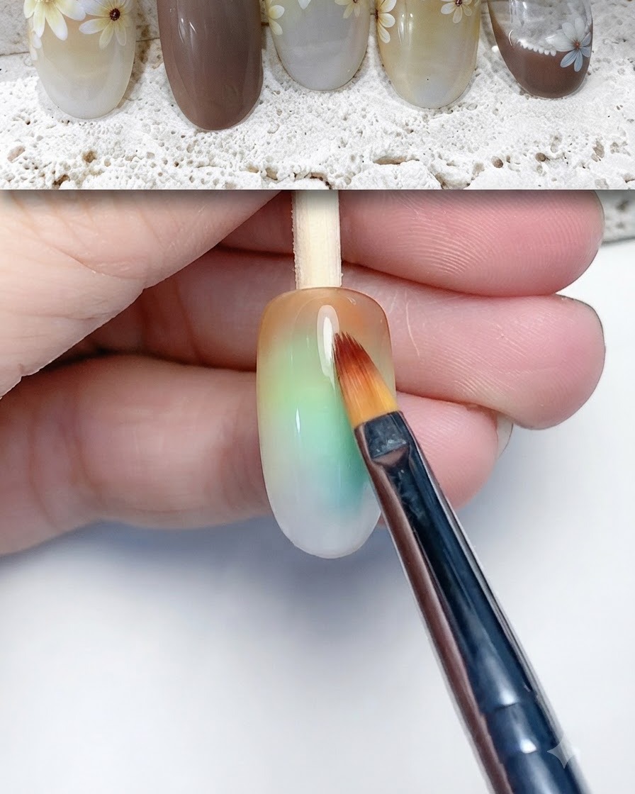 ネイル表面にブラシでブルーミングリキッドまたはジェルを広げている様子。